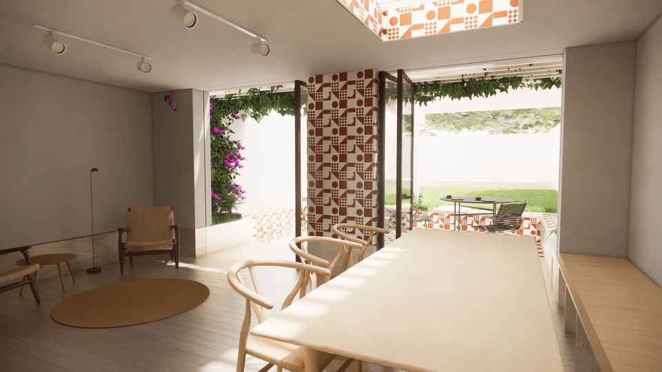 A dining room with a view to a garden, and walls lined with red patterned tiles.