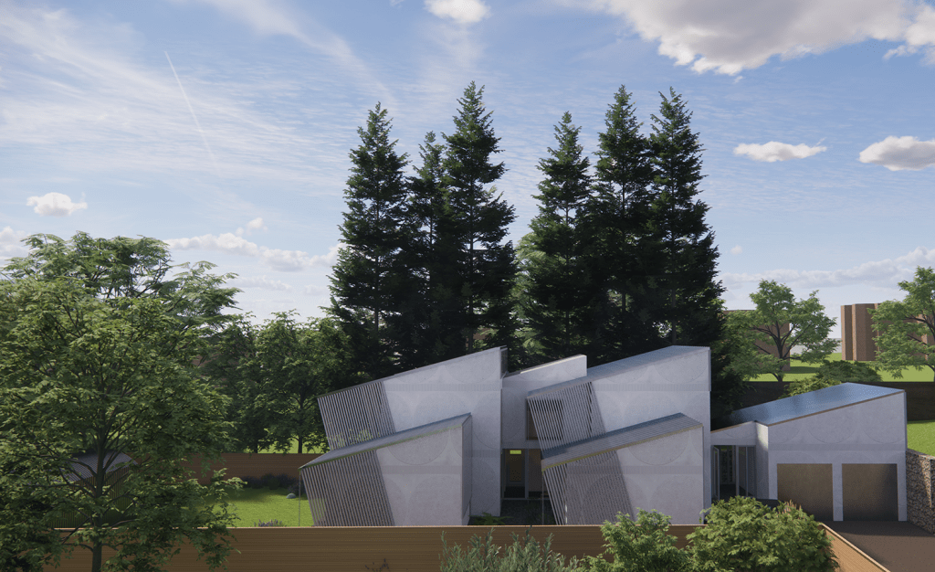 A white lime plastered passive house in a garden.