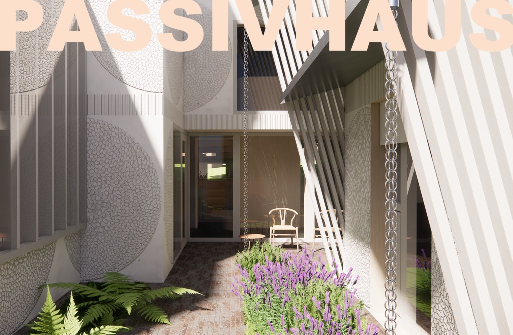 A lime rendered building with a small planted courtyard and a place to sit,