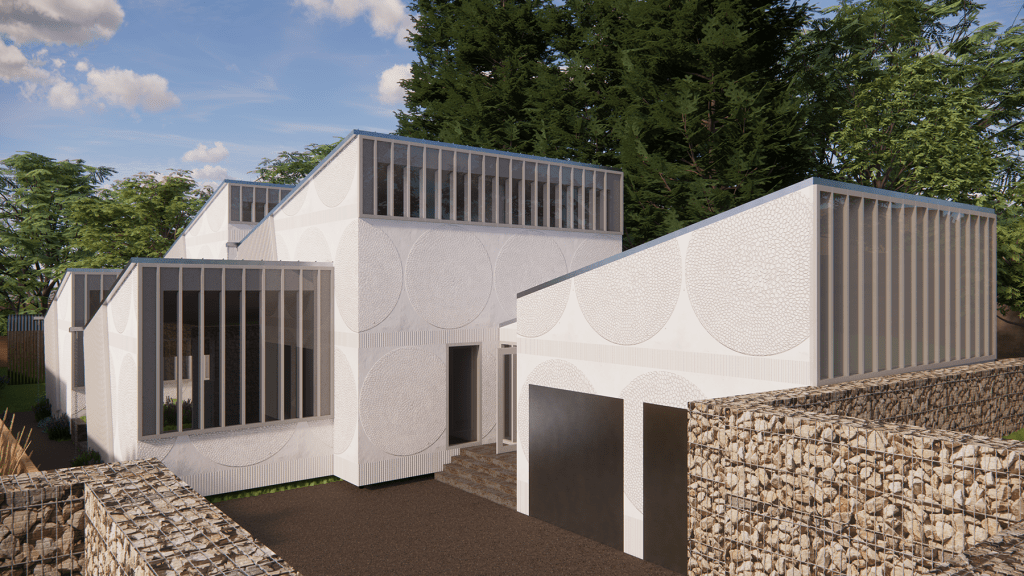 A white lime plastered passive house in a garden.